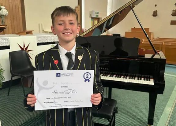Pupils from The Ryleys School a private school in Cheshire, celebrating success at the Alderley Edge Festival 2025