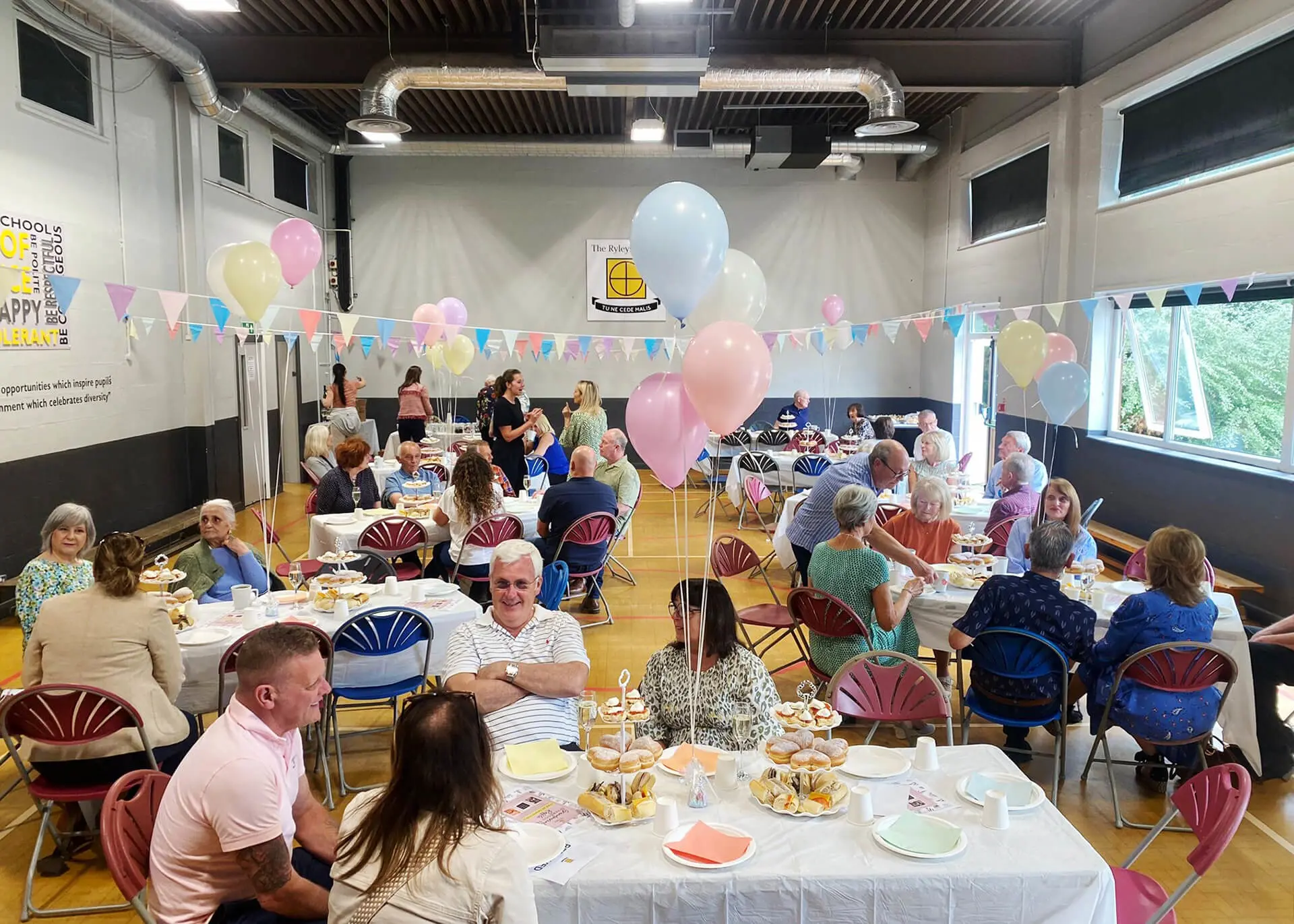 Grandparents enjoying afternoon tea at The Ryleys School, a private school in Cheshire