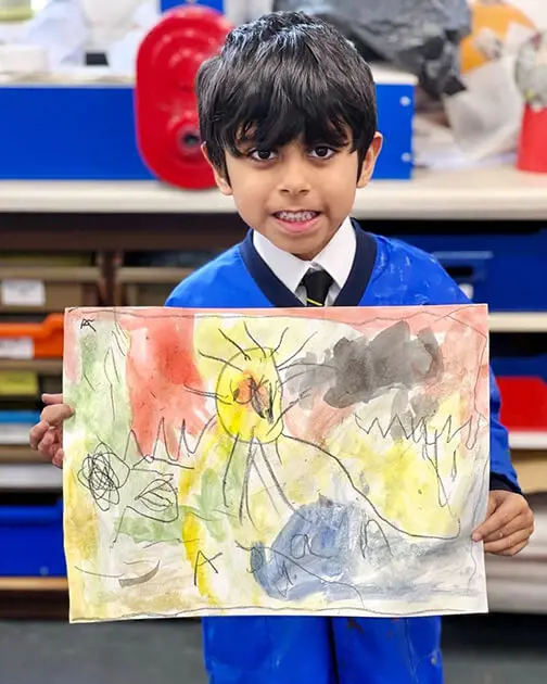 A pupil at The Ryleys School, a private school in Cheshire, showing their Kandinsky-inspired artwork