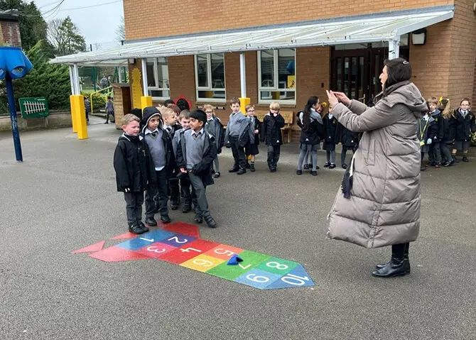 Year 1 pupils at The Ryleys School, a private school in Cheshire, playing the French game La Marella in the playground
