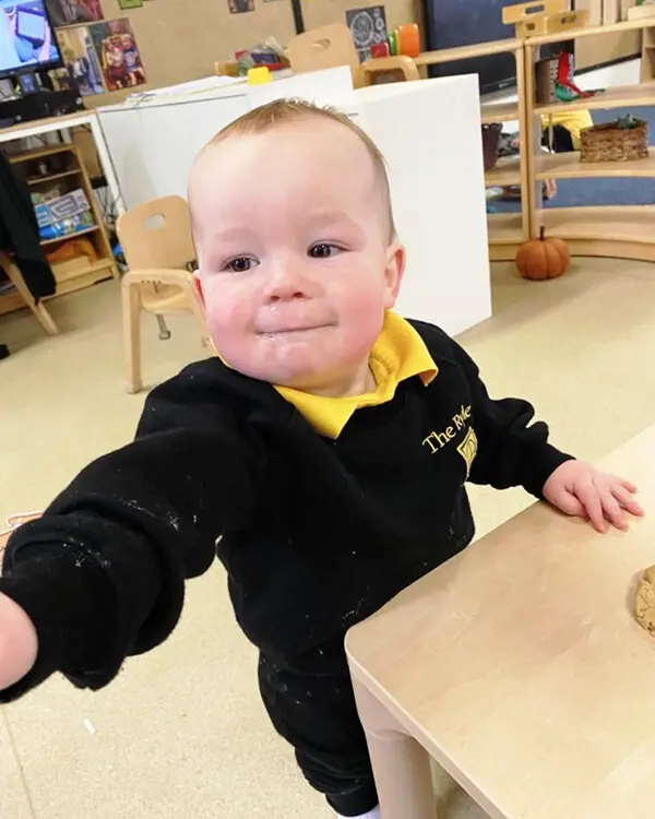 Pupils at Nursery at The Ryleys School, a private school in Cheshire, baking gingerbread men