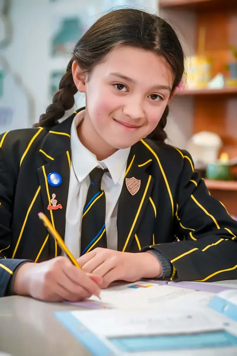 Pupil working in class at The Ryleys School, a private school in Cheshire