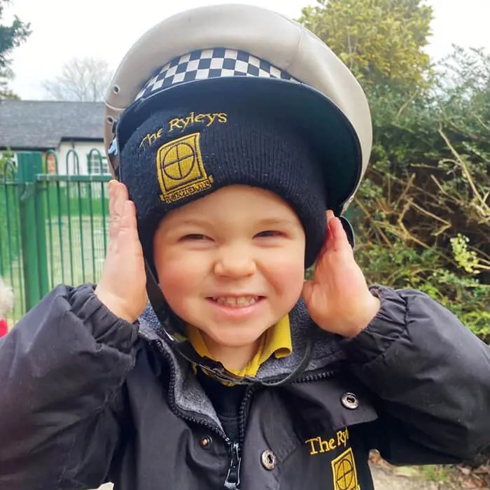 A Pre-School pupil at The Ryleys School, a private school in Alderley Edge, enjoying the visit from Cheshire Police