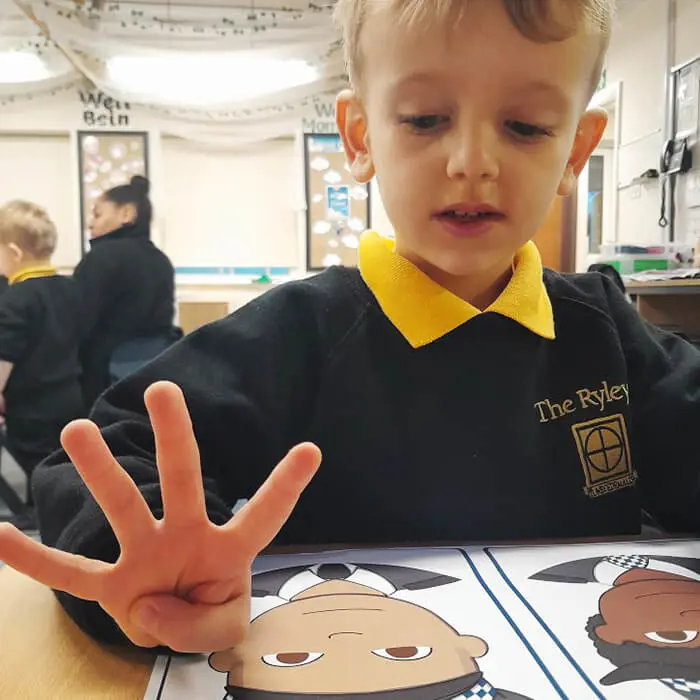 A Pre-School pupil at The Ryleys School, a private school in Alderley Edge, enjoying the visit from Cheshire Police