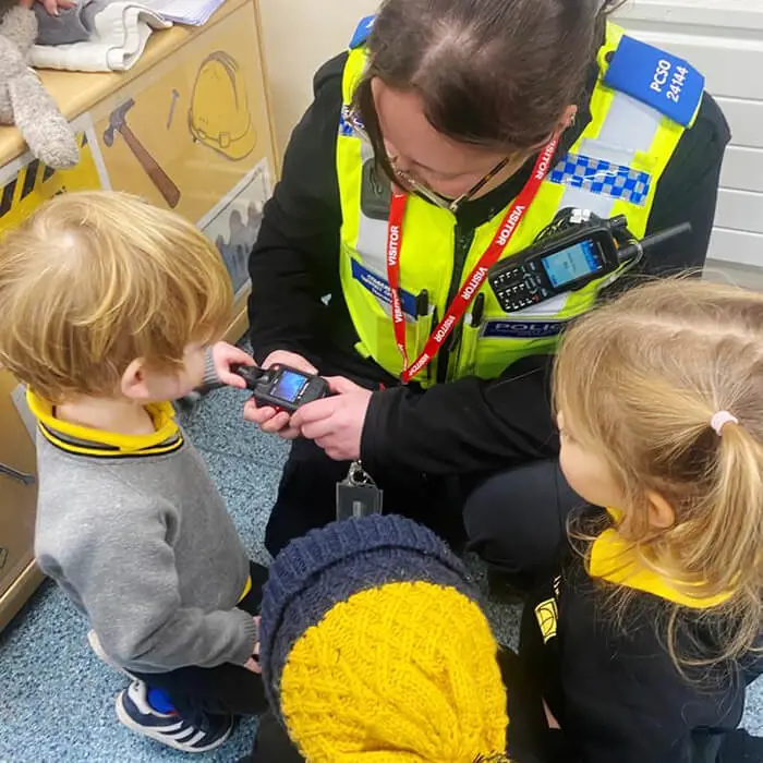 A Pre-School pupil at The Ryleys School, a private school in Alderley Edge, enjoying the visit from Cheshire Police