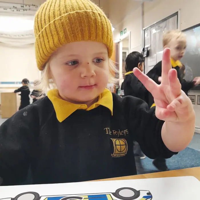 A Pre-School pupil at The Ryleys School, a private school in Alderley Edge, enjoying the visit from Cheshire Police