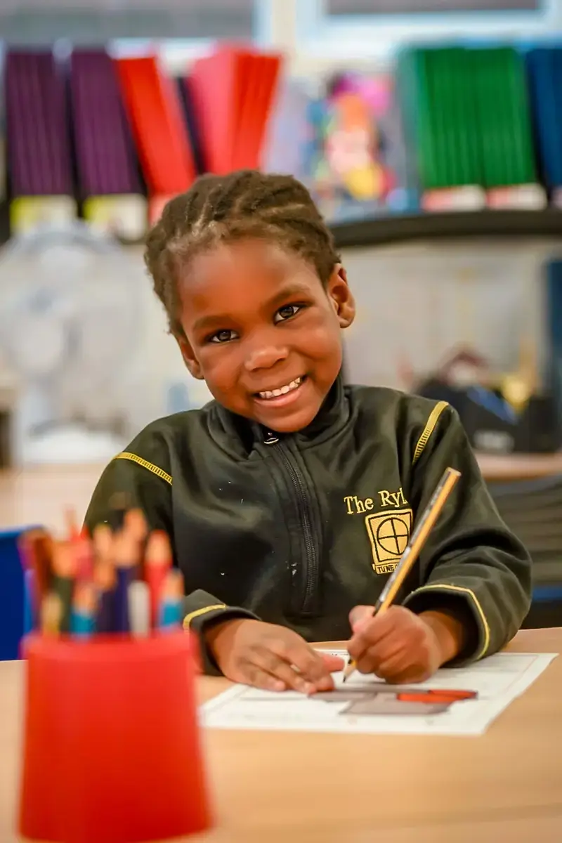Pupil working in class at The Ryleys School, a private school in Cheshire