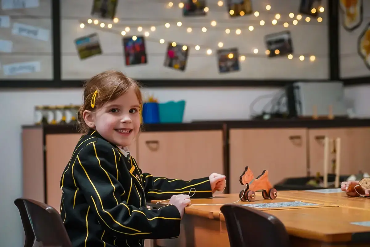 Young pupil in class at The Ryleys School, a prep school in Cheshire
