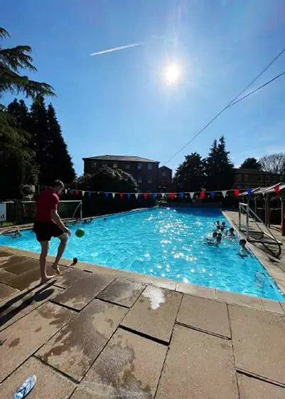 Pupils enjoying water polo in the swimming pool at The Ryleys School, a private school in Cheshire
