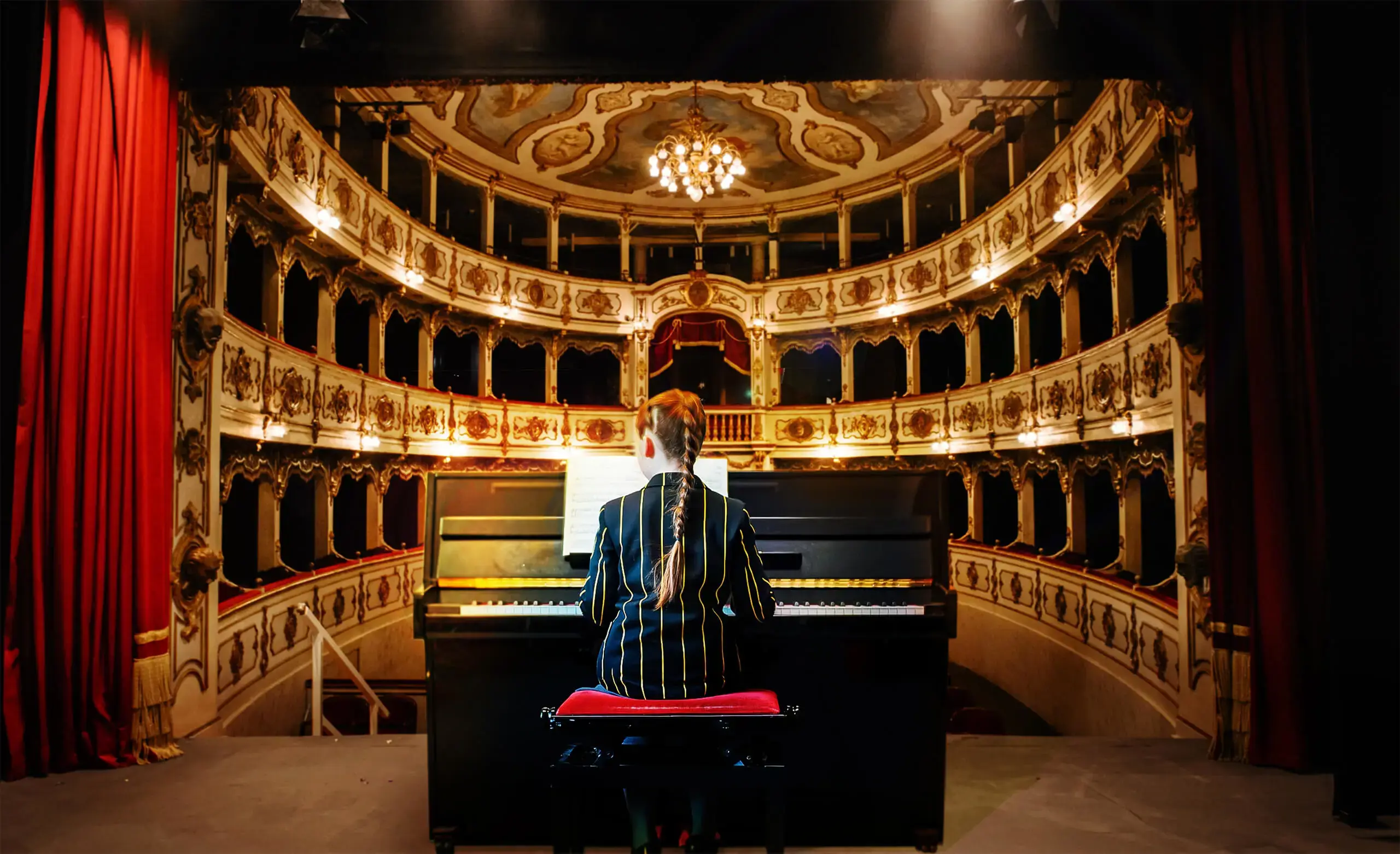 Composite image of pupil at The Ryleys School playing piano in Royal Albert Hall